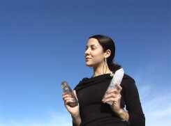 Samantha holding smoky and clear quartz rods